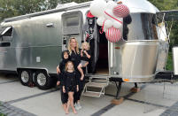 <p>Molly Sims, in partnership with <a href="https://www.outdoorsy.com/" rel="nofollow noopener" target="_blank" data-ylk="slk:Outdoorsy;elm:context_link;itc:0;sec:content-canvas" class="link ">Outdoorsy</a>, hosts a fun Halloween “Carnevil” campsite in her backyard.</p>