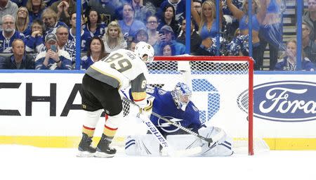 Feb 5, 2019; Tampa, FL, USA; Vegas Golden Knights right wing Alex Tuch (89) scores the game winning goal on Tampa Bay Lightning goaltender Andrei Vasilevskiy (88) during a shootout at Amalie Arena. Mandatory Credit: Kim Klement-USA TODAY Sports