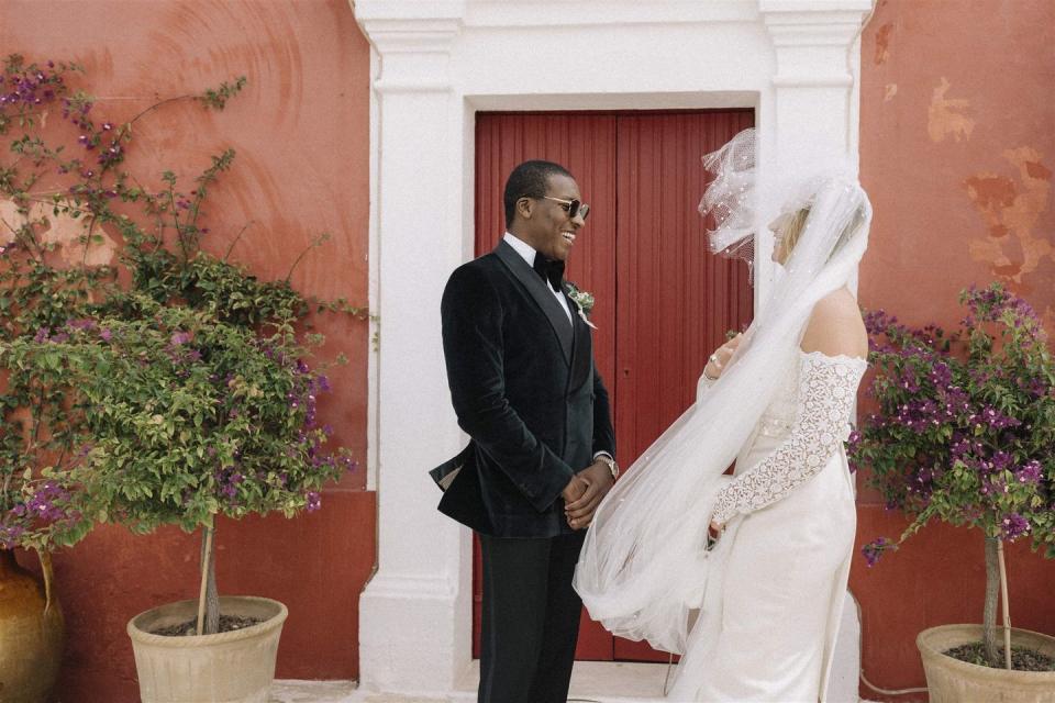 a man and woman in wedding attire