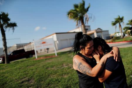 Isabela, an asylum seeker from El Salvador, hugs her 17-year-old daughter Dayana outside of Casa Esperanza, a federal contracted shelter in Brownsville, Texas, U.S., shortly after being reunited with her following their separation at the U.S.-Mexico border. REUTERS/Carlos Barria