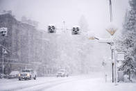 In this photo provided by Mammoth Mountain Ski Area, snow falls on Mammoth Mountain, Monday, Oct. 25, 2021, in Mammoth Lakes, Calif. (Christian Pondella/Mammoth Mountain Ski Area via AP)