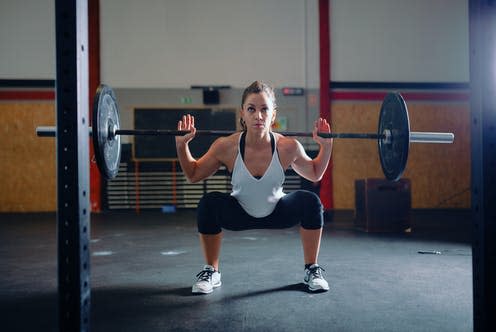 <span class="caption">Don't skip the weights next time you train.</span> <span class="attribution"><a class="link " href="https://www.shutterstock.com/image-photo/athletic-brunette-young-woman-doing-some-1423397399" rel="nofollow noopener" target="_blank" data-ylk="slk:Manu Reyes/ Shutterstock;elm:context_link;itc:0;sec:content-canvas">Manu Reyes/ Shutterstock</a></span>