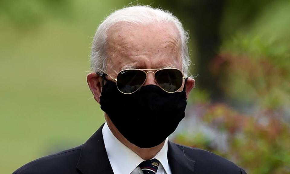 US Democratic presidential candidate Joe Biden wearing a black face mask on Memorial Day in May