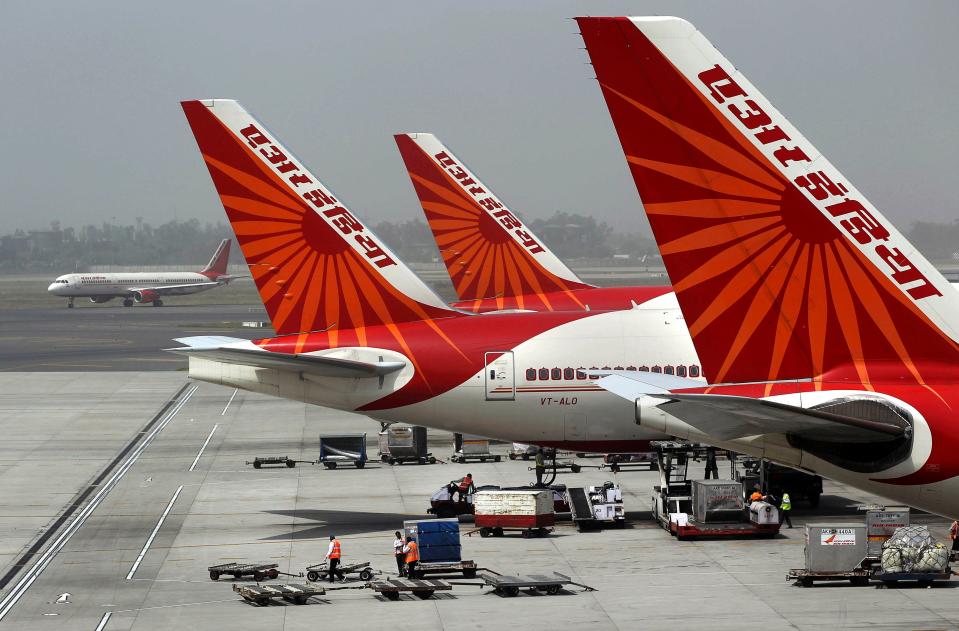 Air India aircrafts stand at Indira Gandhi International Airport in New Delhi, India, April 29, 2011.  An Air India plane flying from New Delhi to San Francisco landed in Russia after it developed an engine problem, officials said on Wednesday, June 7, 2023. The plane, carrying 216 passengers and 16 crew members, landed safely at Russia’s Magadan airport, Air India said in a statement.