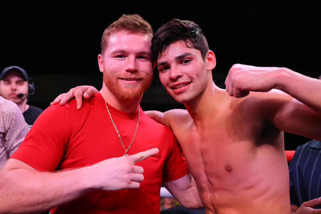 INDIO, CA - MARCH 30: Ryan Garcia posing with Canelo Alvarez inside the ring after his win against Jose Lopez on March 30, 2019 at Fantasy Springs Casino in Indio, CA (Photo by Tom Hogan/Golden Boy/Getty Images)