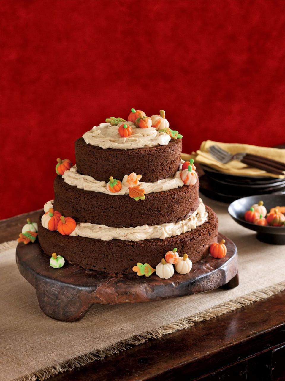 <p>Three layers of tasty pumpkin spice cake topped with tiny adorable pumpkins? Your guests simply won't be able to resist.</p><p><em><a href="https://www.womansday.com/food-recipes/food-drinks/recipes/a13686/pumpkin-spice-cake-3559/" rel="nofollow noopener" target="_blank" data-ylk="slk:Get the recipe for Layered Pumpkin Spice Cake;elm:context_link;itc:0;sec:content-canvas" class="link ">Get the recipe for Layered Pumpkin Spice Cake</a>.</em></p>