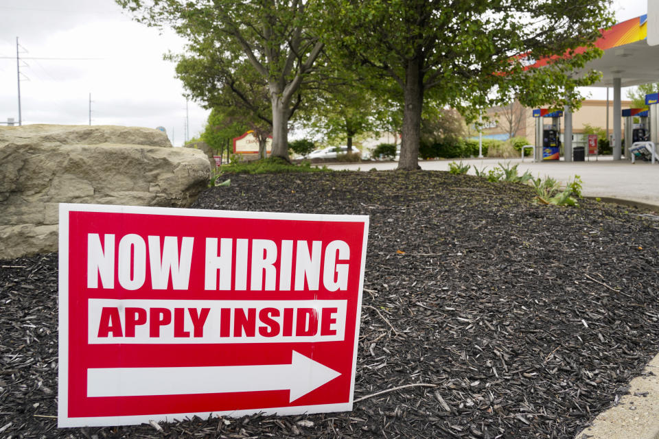 Hiring signs are posted outside a gas station in Cranberry Township, Butler County, Pa., Wednesday, May 5, 2021. (Keith Srakocic/AP)