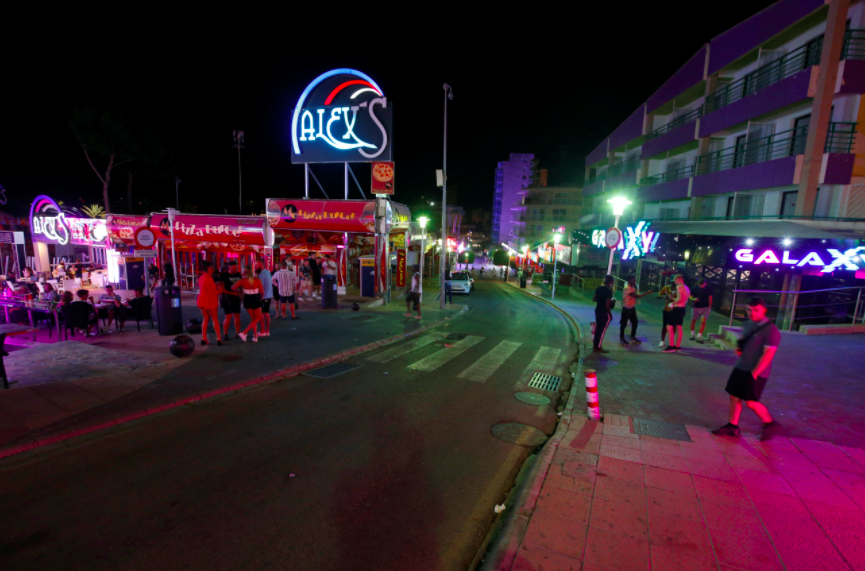 Tourists on the party strip were filmed appearing to flout social distancing rules. (Reuters)