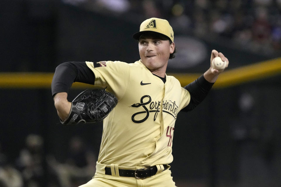 Arizona Diamondbacks pitcher Tommy Henry throws to a San Francisco Giants batter during the first inning during a baseball game Friday, Sept. 23, 2022, in Phoenix. (AP Photo/Rick Scuteri)