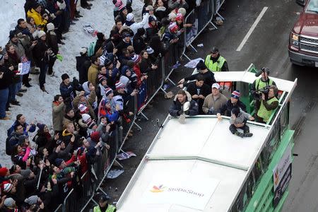 Feb 4, 2015; Boston, MA, USA; The New England Patriots quarterback Tom Brady travels down Boylston Street on a duck boat during the Super Bowl XLIX rolling rally parade. USA TODAY Sports