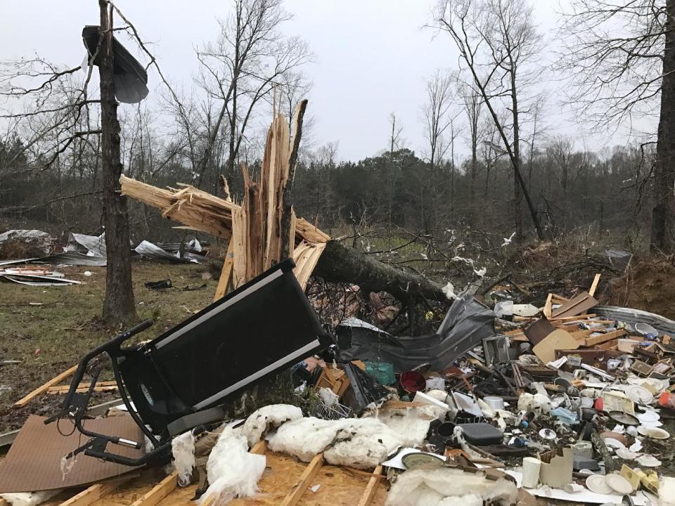 Debris lies on the ground after a storm south of Mount Olive, Miss., moved through Monday, Jan. 2, 2017. Forecasters say damaging winds, hail and flash flooding will be possible on Monday as a storm system moves across the South. (Ryan Moore/WDAM-TV via AP)