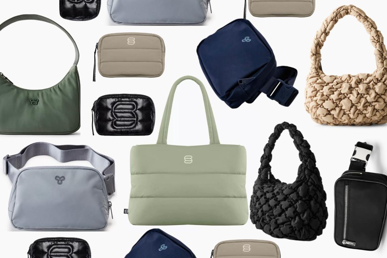 a bunch of aritzia bags on plain background