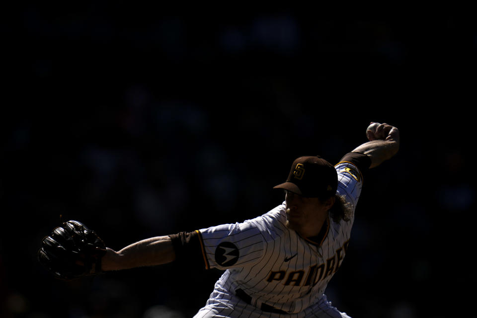 San Diego Padres relief pitcher Tim Hill works against a Cincinnati Reds batter during the eighth inning of a baseball game Wednesday, May 3, 2023, in San Diego. (AP Photo/Gregory Bull)