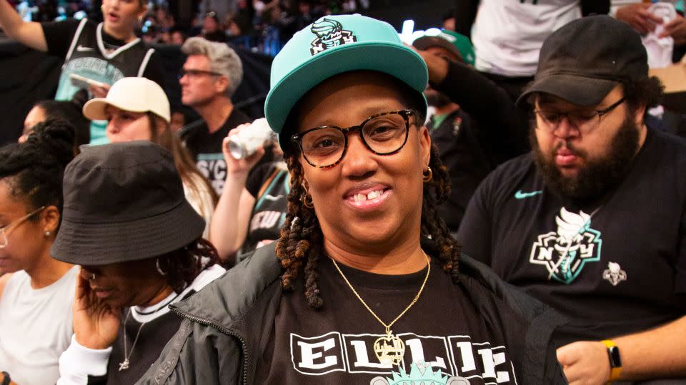 Neysa Lewis, who became a Liberty season ticket holder this year, sports an Ellie T-shirt for the big game. - Laura Oliverio/CNN