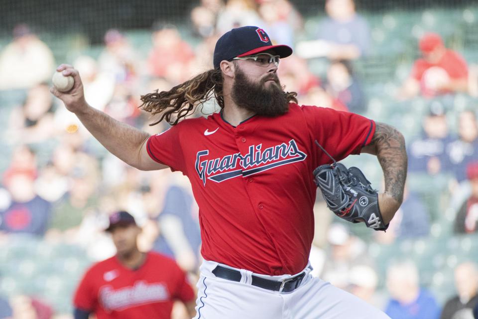Cleveland Guardians starting pitcher Hunter Gaddis delivers against the New York Yankees during the first inning of a baseball game in Cleveland, Tuesday April 11, 2023. (AP Photo/Phil Long)