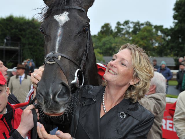 <p>Barry Cronin/PA Images/Getty</p> Lady Madeline Lloyd-Webber pictured after Jockey William Buick rode The Fugue to victory during the Red Mills Irish Champion Stakes Day.