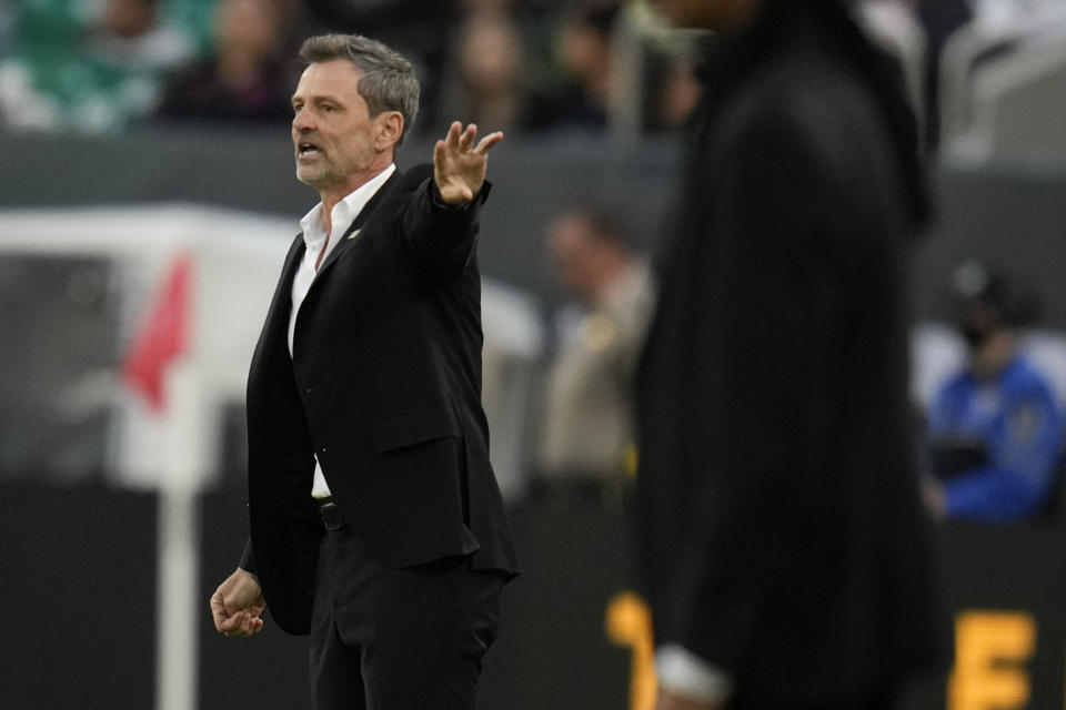 Mexico manager Diego Cocca gestures during the first half of a friendly soccer match against Cameroon Saturday, June 10, 2023, in San Diego. (AP Photo/Gregory Bull)