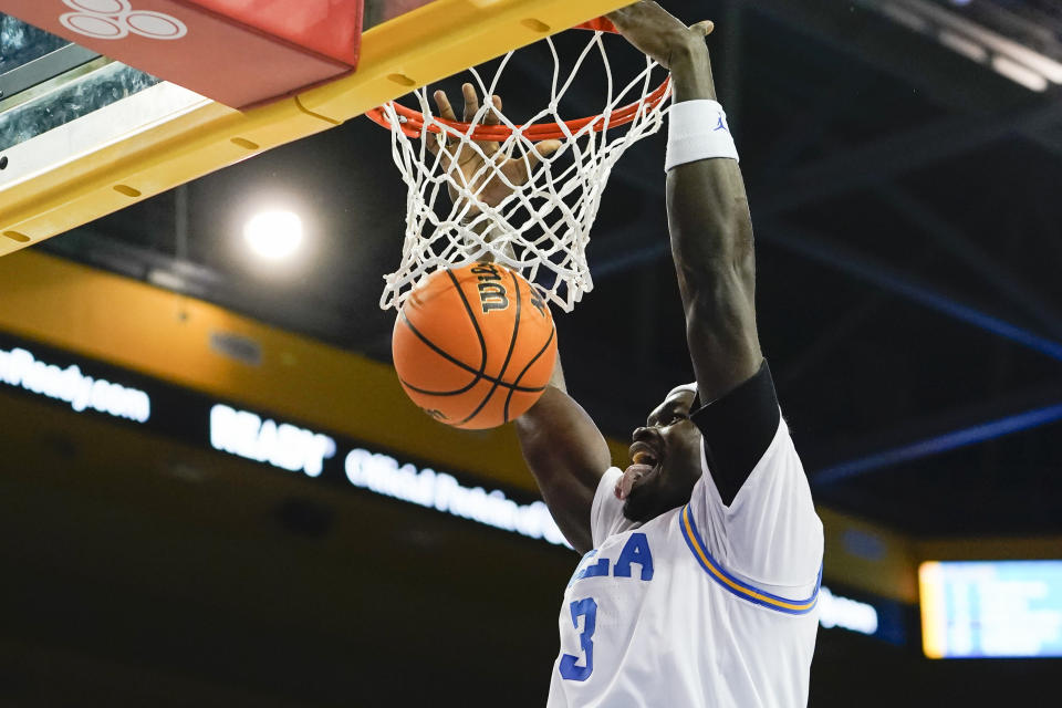 UCLA forward Adem Bona reacts after dunking the ball during the first half of an NCAA college basketball game against St. Francis, Monday, Nov. 6, 2023, in Los Angeles. (AP Photo/Ryan Sun)