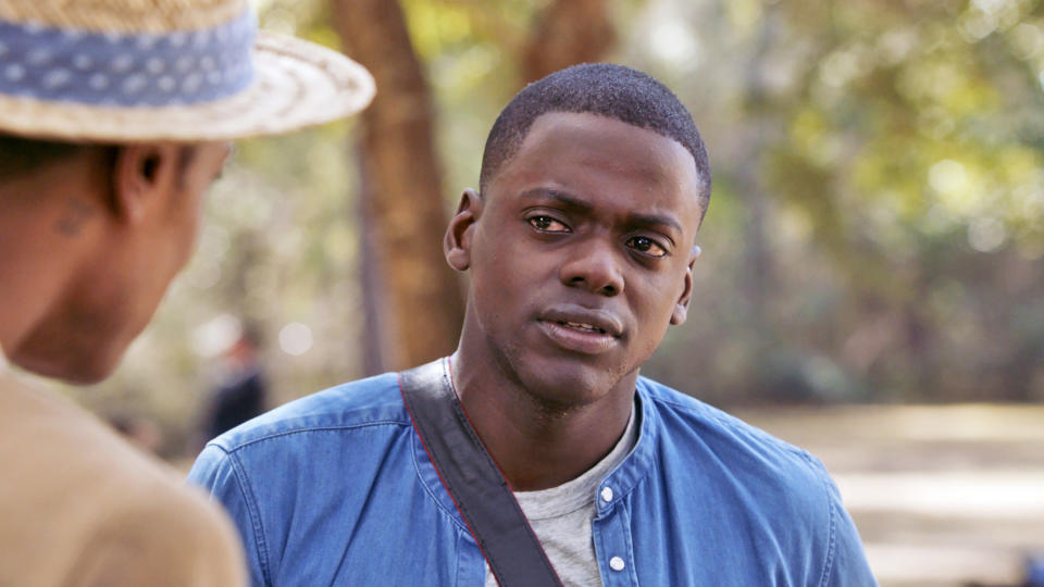 David Kaluuya looking skeptically at Lakeith Stanfield