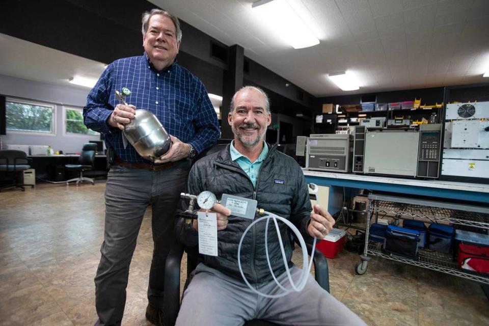 Environmental chemist Steve Hoyt, left, and environmental engineer Tim Nelligan, hold equipment they use for testing soil vapor, at their San Luis Obispo lab in May 2024. After they used their method to test Susan Flores’ neighbor’s yard in the search for Kristin Smart’s body, they were hired to do similar testing in a Washington state murder case.