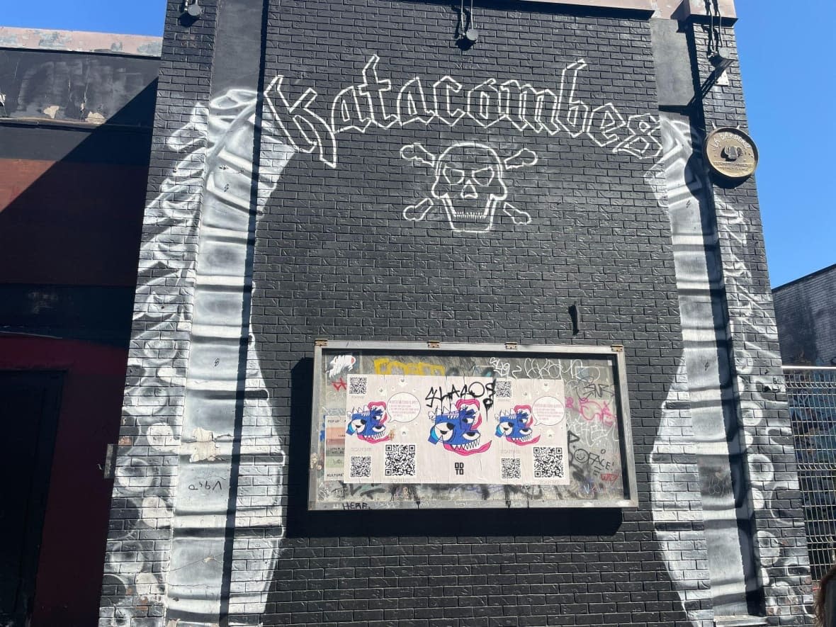 Katacomes, at the corner of St-Laurent Boulevard and Ontario Street, still stands out for its skull-themed street art.  (John Ngala/CBC  - image credit)