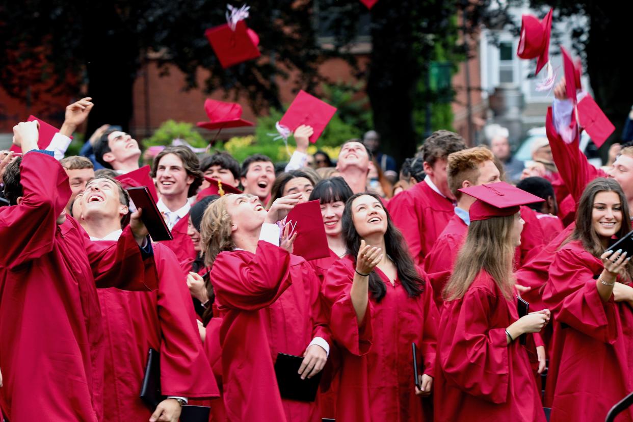 Worcester Academy graduates celebrate their new status.