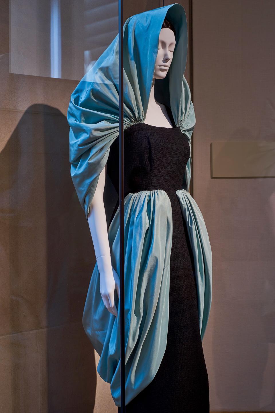 Eisa (Spanish, 1927–68). Cristóbal Balenciaga (Spanish, 1895–1972). Evening Dress, 1949. Black silk cloque and light blue silk taffeta.