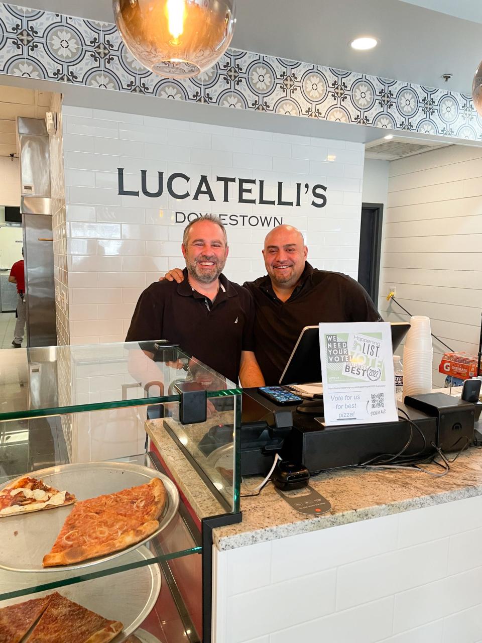 Joe Guardino, left, manager, and Dave Schiano, owner, stand inside Lucatelli's Pizzeria, which opened in Doylestown Borough earlier this month.