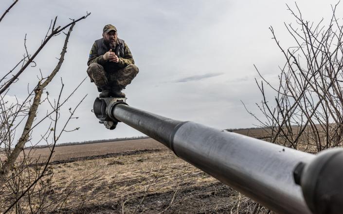 A Ukrainian soldier is seen on an artillery gun - Anadolu Agency/Anadolu