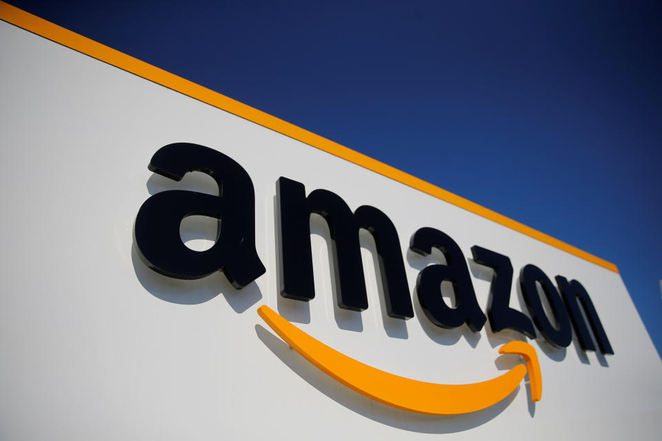 The logo of Amazon is seen at the company logistics center in Lauwin-Planque, northern France, April 22, 2020 after Amazon extended the closure of its French warehouses until April 25 included, following dispute with unions over health protection measures amid the coronavirus disease (COVID-19) outbreak.  REUTERS/Pascal Rossignol