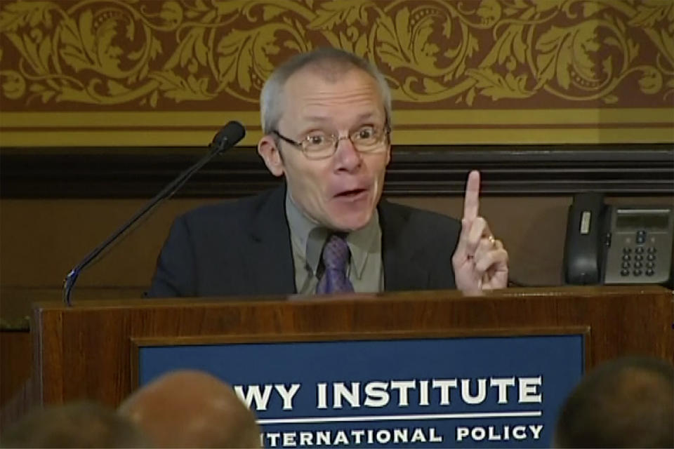 FILE - In this image taken from a video, Sean Turnell, an economist at Australia's Macquarie University, speaks in front of audience at the Lowy Institute in Sydney, Australia on Nov. 28, 2013. Reports say detained Australian Sean Turnell, Briton Vicky Bowman, Japanese filmmaker Toru Kubota released in Myanmar. (Australian Broadcasting Corporation via AP, File)