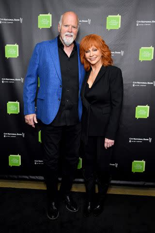 <p>Noam Galai/Getty</p> Rex Linn (left) and Reba McEntire in New York City on Oct. 9, 2023