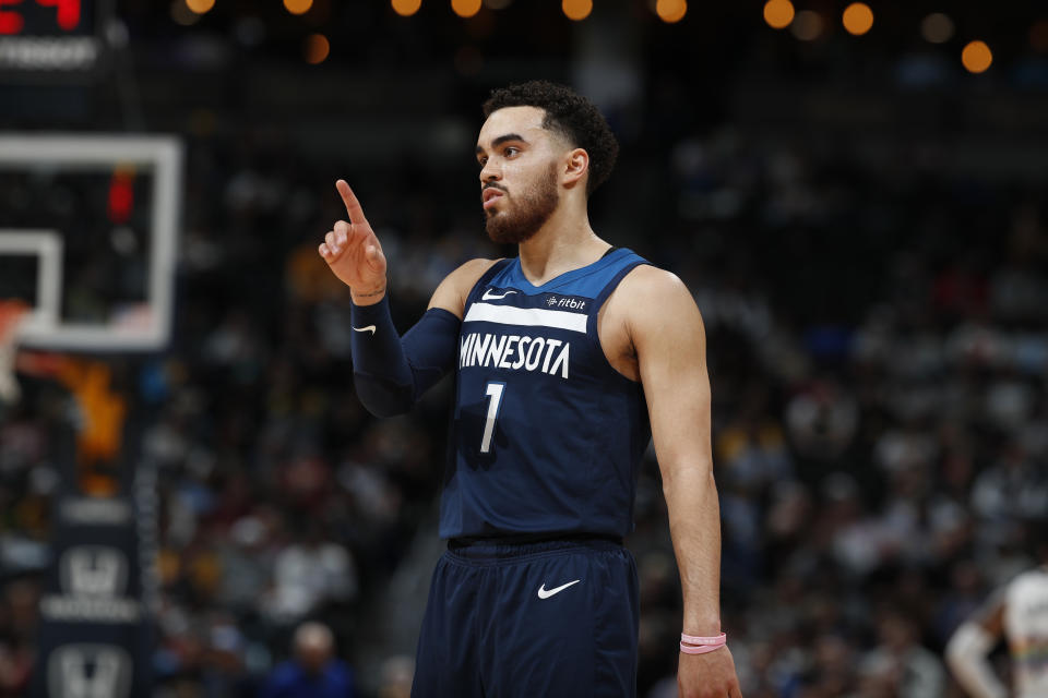 Minnesota Timberwolves guard Tyus Jones (1) in the second half of an NBA basketball game Wednesday, April 10, 2019, in Denver. The Nuggets won 99-95. (AP Photo/David Zalubowski)