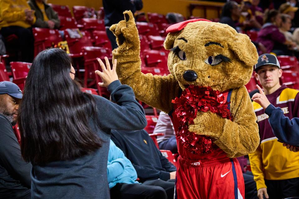 Wilma Wildcat interacts with fans before the Arizona Wildcats face the Arizona State Sun Devils at Desert Financial Arena on Sunday, Jan. 22, 2023.