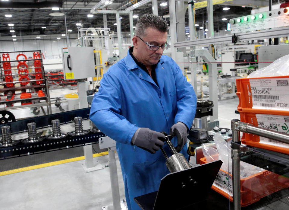 General Motors production worker Joseph Stanton works on the 10-speed transmission assembly at the General Motors (GM) Powertrain Transmission plant in Toledo, Ohio, U.S., March 6, 2019. Picture taken March 6, 2019.  REUTERS/Rebecca Cook