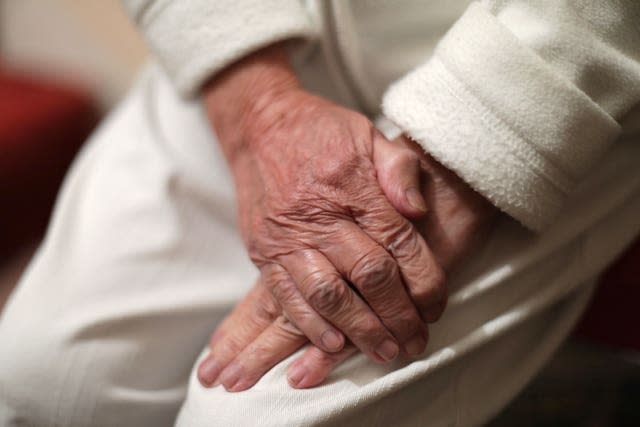 An elderly person's hands (Yui Mok/PA)