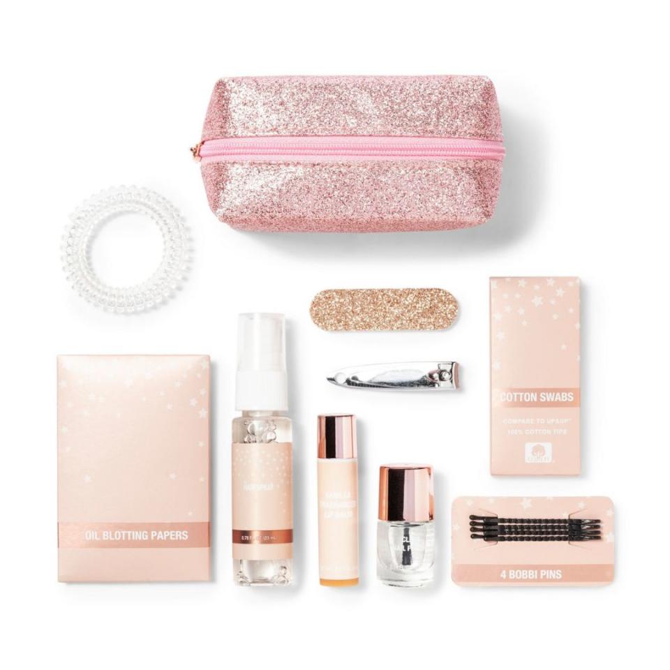 This handy emergency kit is a perfect stocking stuffer. It has&nbsp;everything you need to fix a beauty malfunction &mdash; oil blotting papers, cotton swabs, clear nail polish and more. Plus, it's purse-friendly.&nbsp;<br /><br /><strong><a href="https://www.target.com/p/emergency-makeup-kit-9pc-target-beauty-153/-/A-75564300" target="_blank" rel="noopener noreferrer">Get the Emergency Makeup Kit for $8.</a></strong>