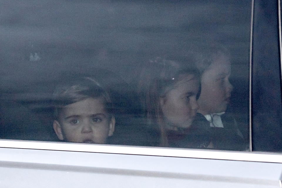 Prince Louis, Princess Charlotte and Prince George leave Buckingham Palace with their parents. (Image via Dominic Lipinski/PA Wire)