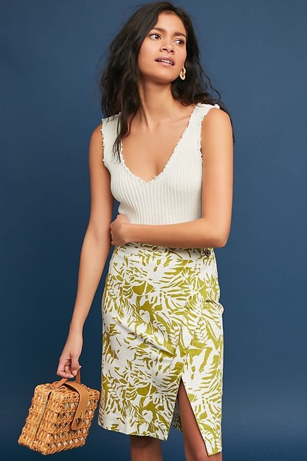 Get it at <a href="https://www.anthropologie.com/shop/daintree-pencil-skirt?category=SEARCHRESULTS&amp;color=038" target="_blank">Anthropologie</a>, $98.