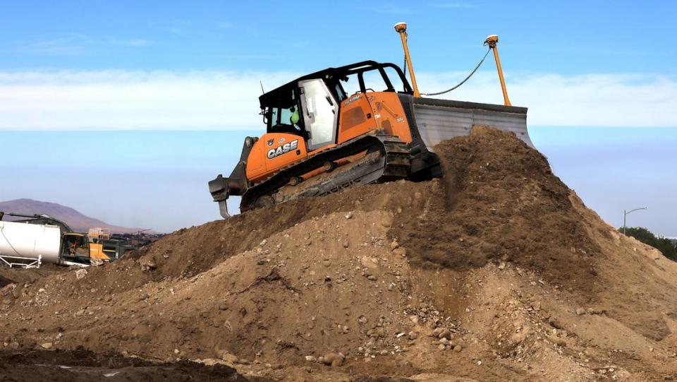 Heavy equipment redistributes dirt on the site of the new LivAway Suites 126-unit extended stay hotel project north of Columbia Center mall at 1289 Tapteal Drive in Richland The $12 million, hotel is expected to open in 2024. The property is visible from Highway 240, west of Columbia Center Boulevard.