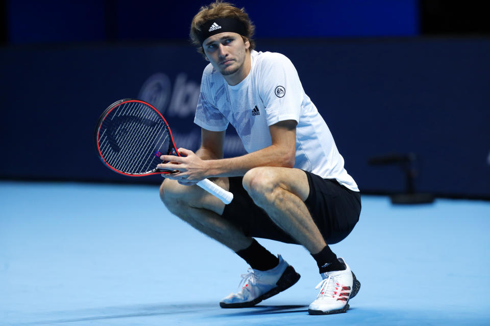 Alexander Zverev of Germany reacts as he plays against Novak Djokovic of Serbia during their singles tennis match at the ATP World Finals tennis tournament at the O2 arena in London, Friday, Nov. 20, 2020. (AP Photo/Frank Augstein)