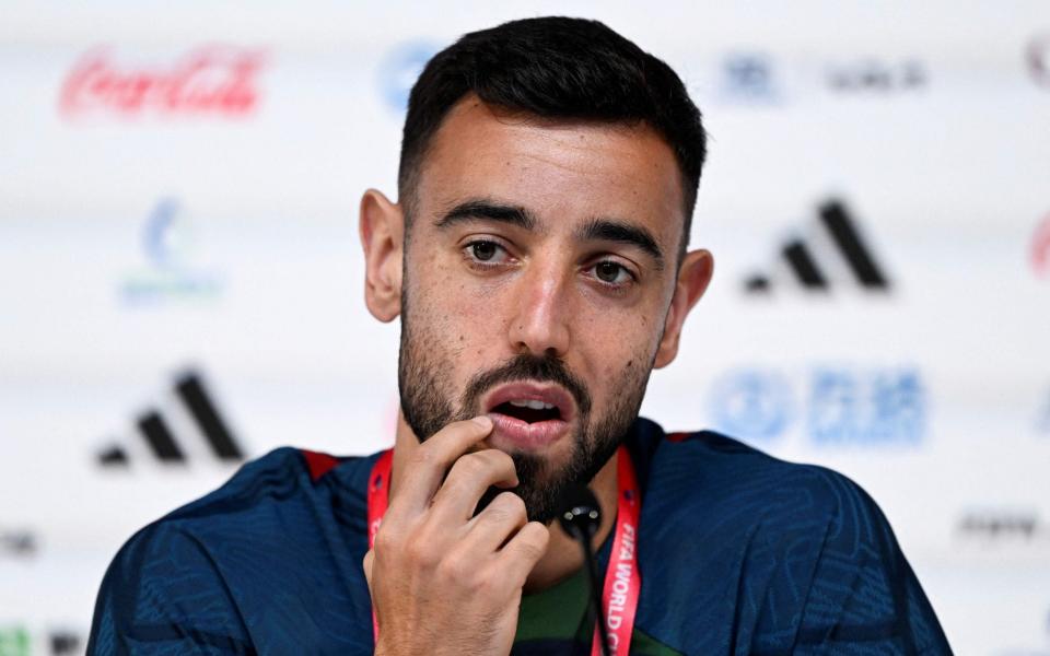 Portugal's midfielder #08 Bruno Fernandes attends a press conference at the Qatar National Convention Center (QNCC) in Doha on November 23, 2022, on the eve of the Qatar 2022 World Cup football match between Portugal and Ghana - AFP via Getty Images