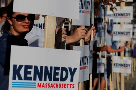 Supporters wait for U.S. Rep. Kennedy III to arrive to announce his candidacy for the U.S. Senate in Boston