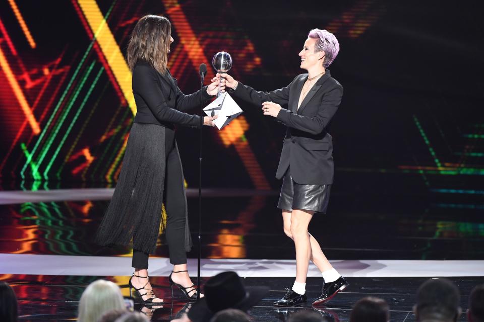 Megan Rapinoe wore a tuxedo blazer with leather shorts from Coach.