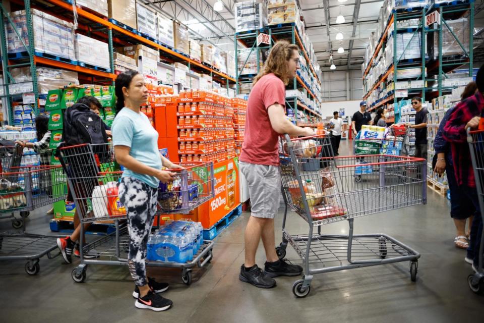 PHOTO: Customers wait in line to check out purchases at Costco store on June 28, 2023 in Teterboro, New Jersey. (Kena Betancur/VIEWpress/Corbis via Getty Images)
