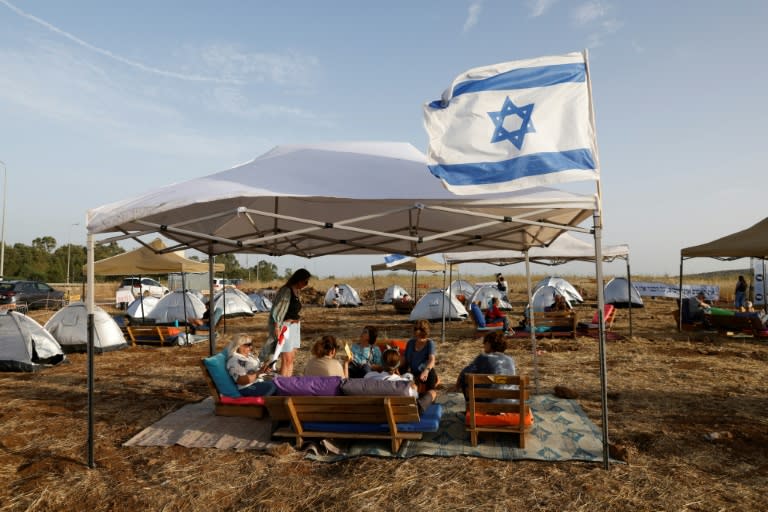 Israeli activists have set up a protest camp near the Lebanese border to demand action to restore security so that the border area's 60,000 evacuees can return to their homes (Jalaa MAREY)