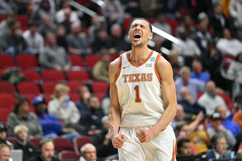 Texas forward Dylan Disu celebrates in the last seconds of a 71-66 victory over Penn State in an NCAA Tournament second-round game at Wells Fargo Arena in Des Moines on Saturday. Disu had 28 points to carry Texas into the Sweet 16 for the first time in 15 years.