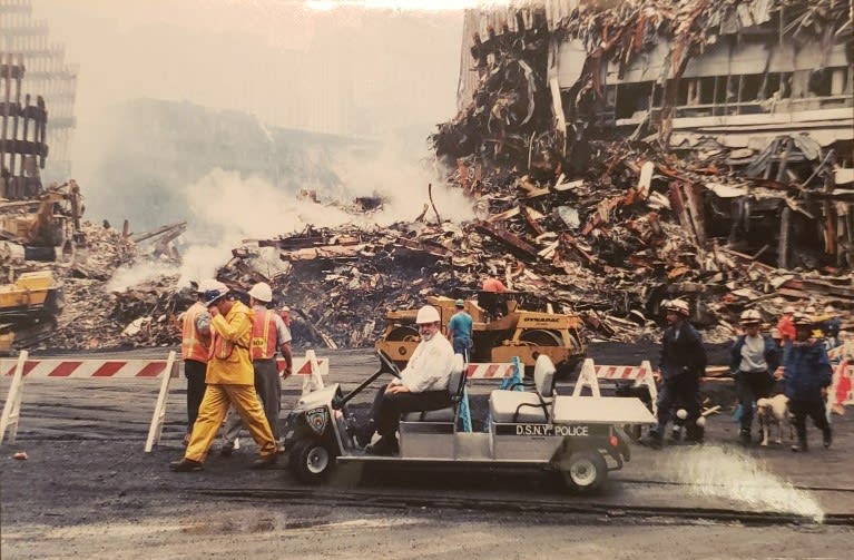 <div class="inline-image__caption"><p>Charlie Burge at the WTC site.</p></div> <div class="inline-image__credit">Courtesy Charlie Burge</div>