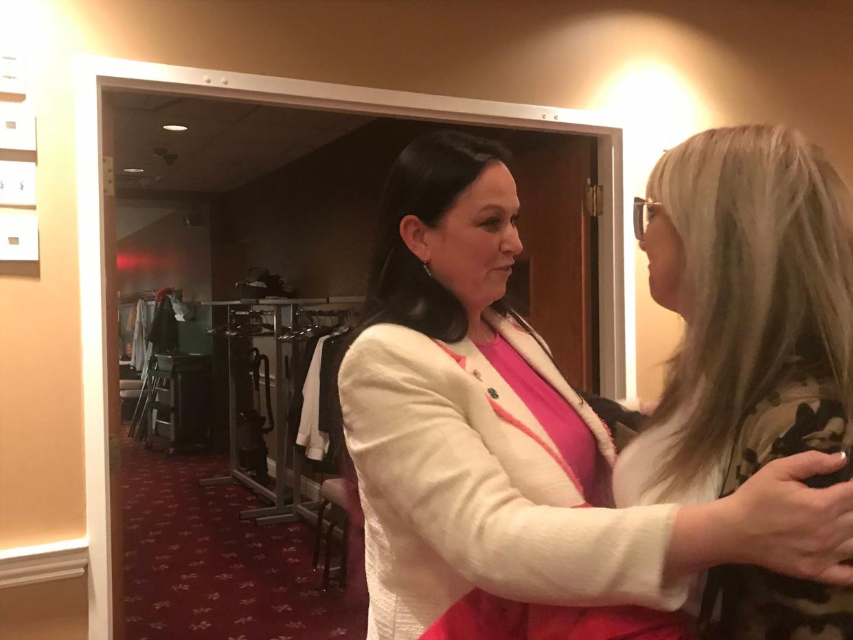 City treasurer-elect Colleen Redpath Feger (left) embraces a supporter following her Election Day victory on Tuesday, April 4, 2023.