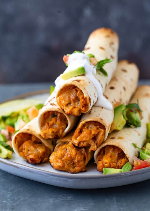 <p>Crispy chicken taquitos filled with a creamy spicy chicken mixture and baked or air-fried to perfection!</p><p><strong>Get the recipe: <a href="https://gimmedelicious.com/chicken-taquitos/" rel="nofollow noopener" target="_blank" data-ylk="slk:Air Fryer Chicken Taquitos;elm:context_link;itc:0;sec:content-canvas" class="link rapid-noclick-resp">Air Fryer Chicken Taquitos</a></strong></p>